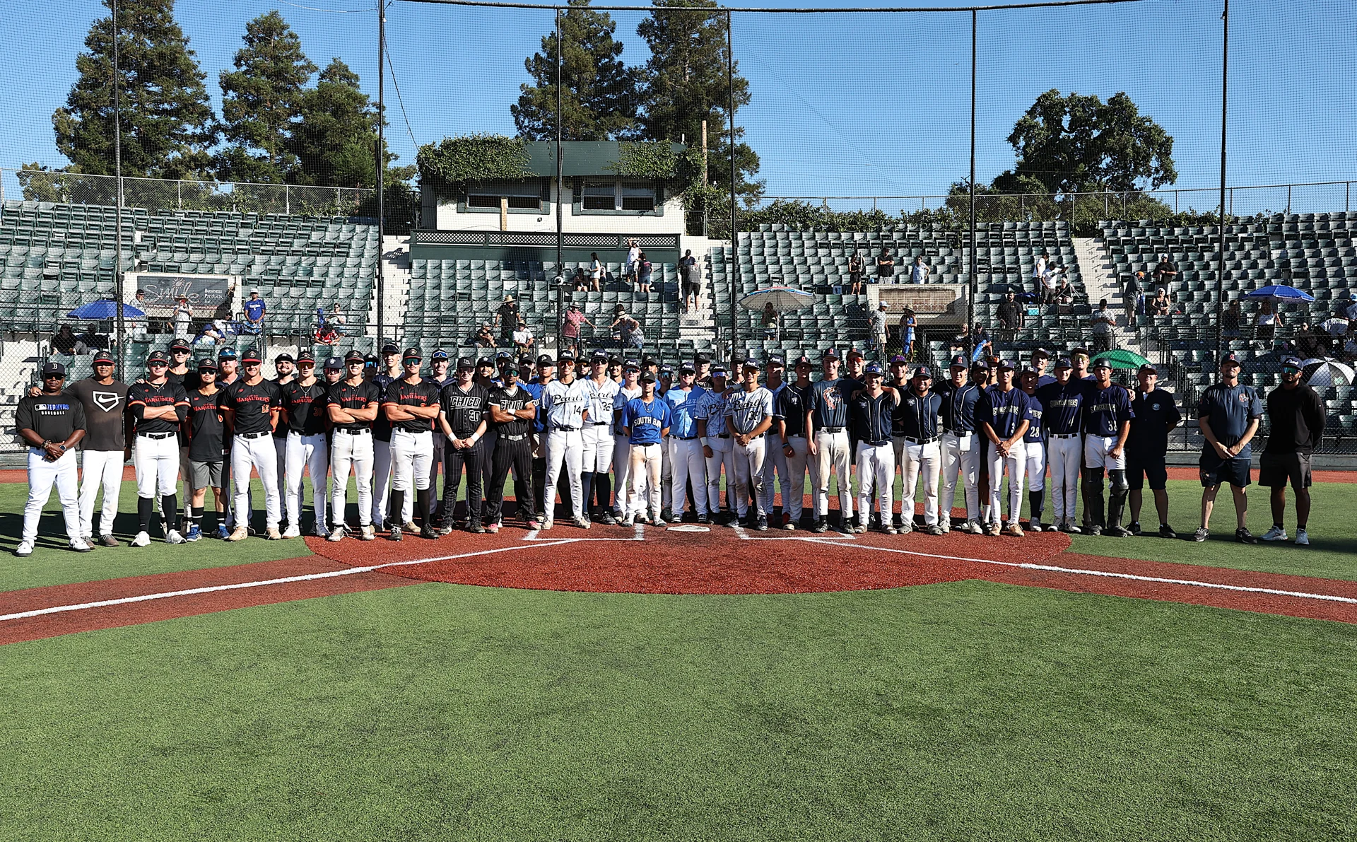 BACL All-Star players and coaches gathered on the field